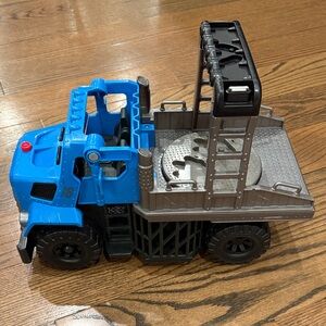 Jurassic Park Blue and Black Toy Truck